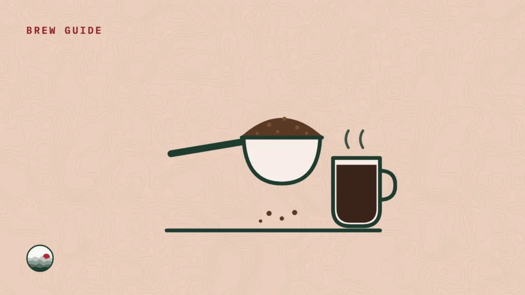 Illustration of a coffee scoop heaped with ground coffee beside a mug